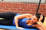 How to Do a Reclining Leg Raise for Female Leg Workout - How